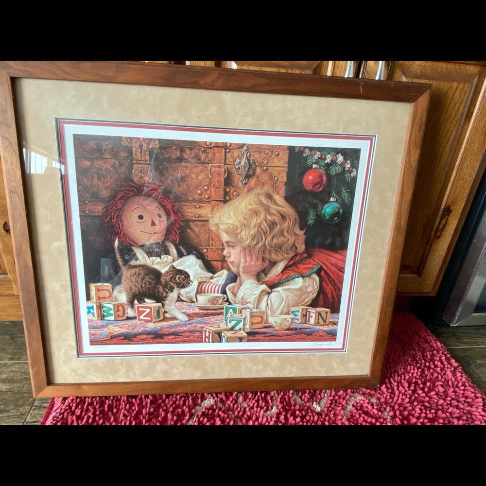 Him Daly “My Favorite Gift” print in walnut frame